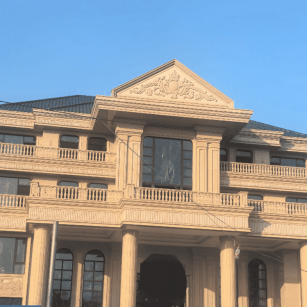 吕梁黄金麻别墅外墙干挂石材效果示例