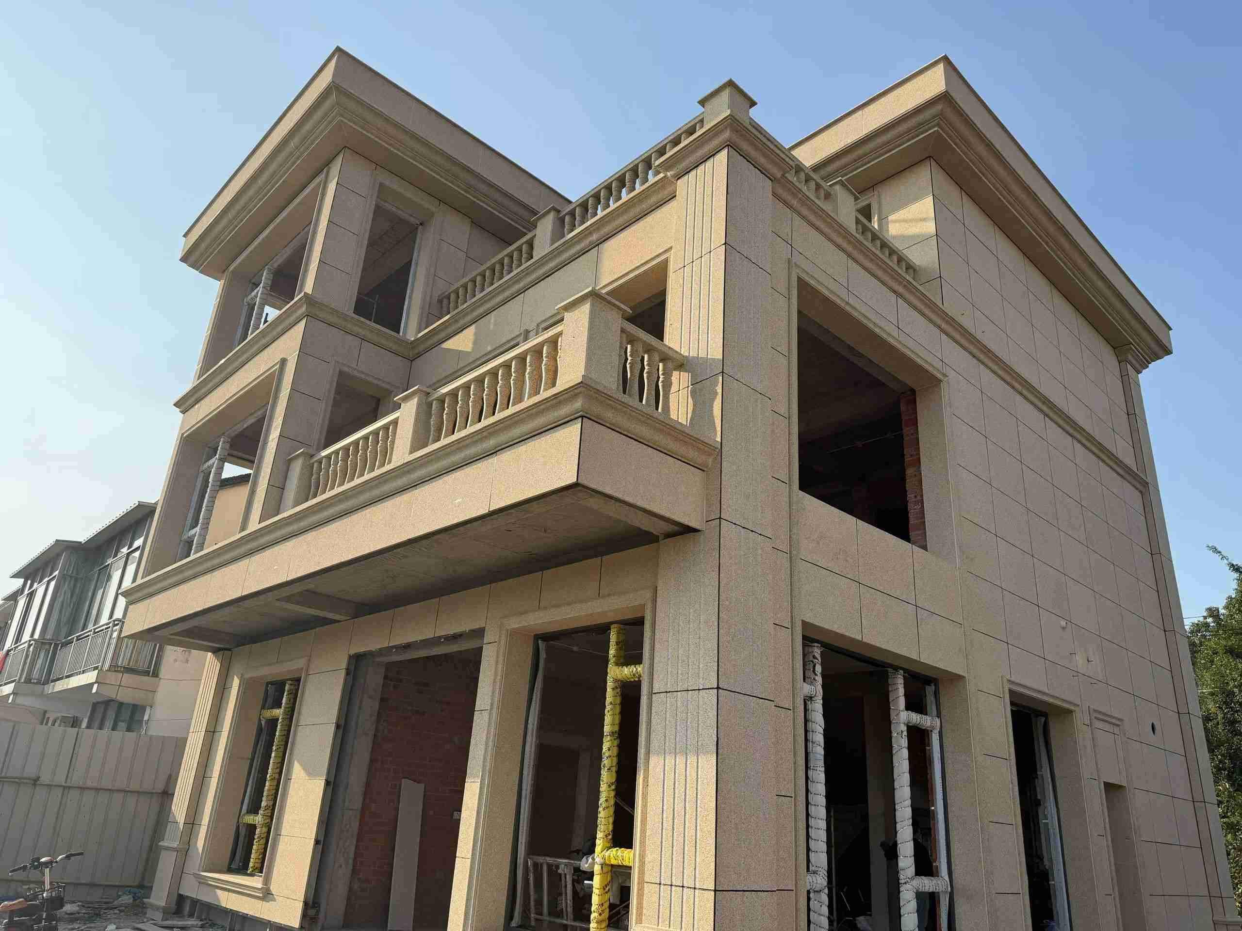 吕梁 黄金麻花岗岩石材荔枝面外墙干挂效果展示