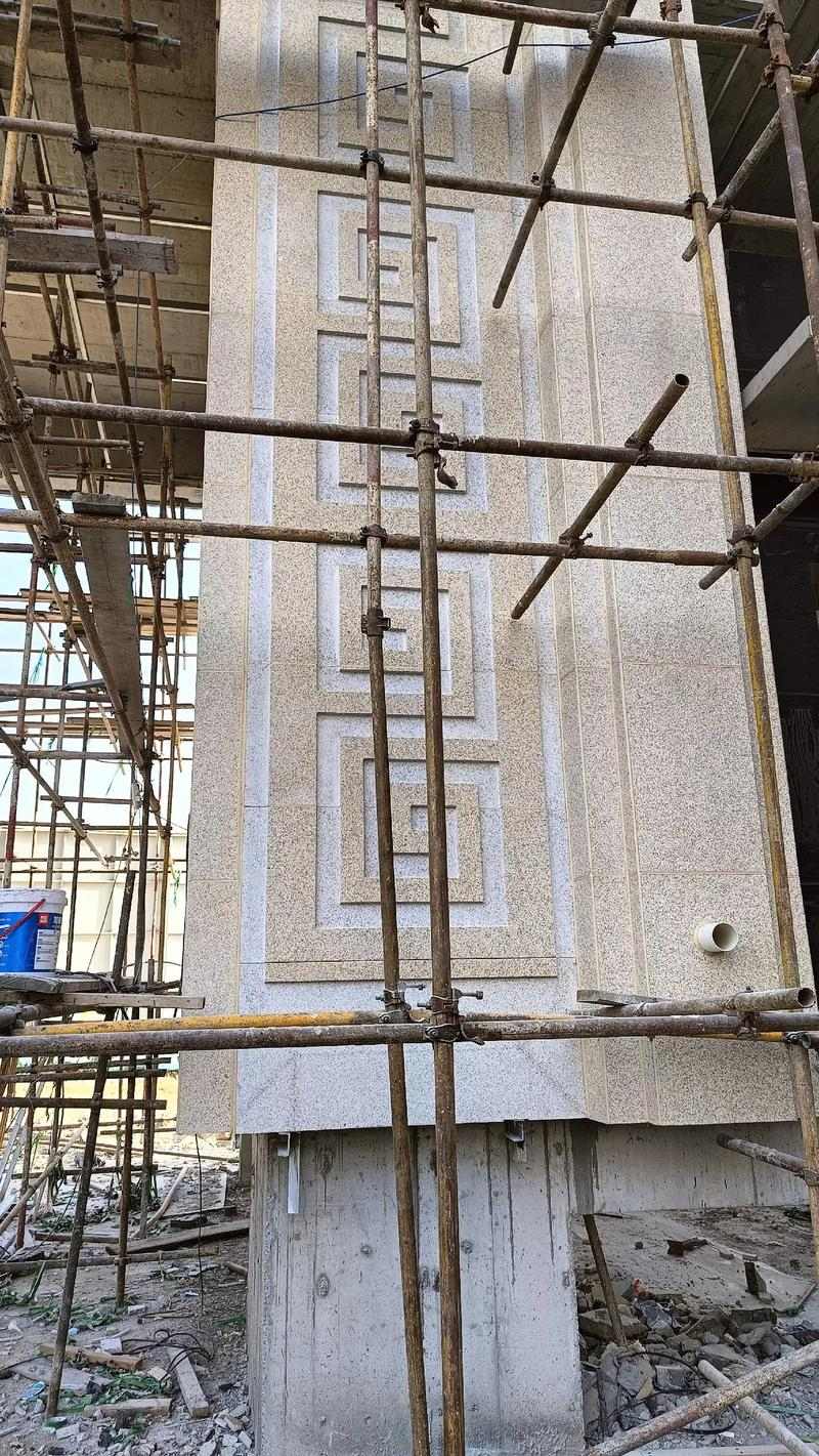 吕梁 黄金麻花岗岩别墅外墙干挂回纹造型效果